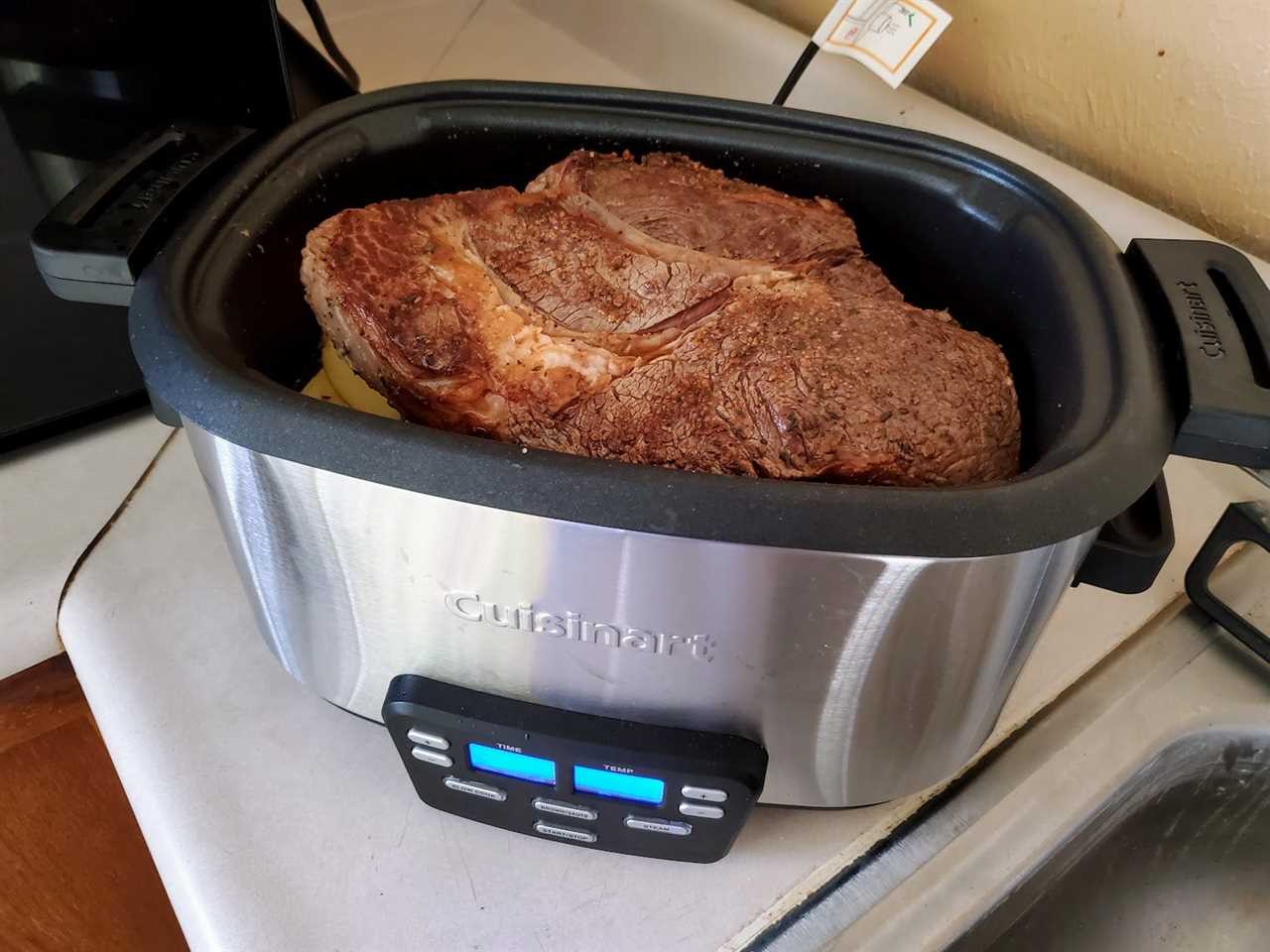 A large chuck roast is displayed in the Cuisinart Cook Central Multi-Cooker.