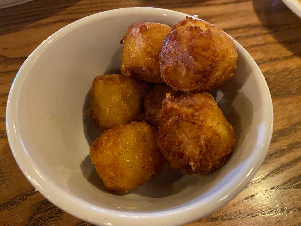 bowl of hashbrown casserole tots at cracker barrel
