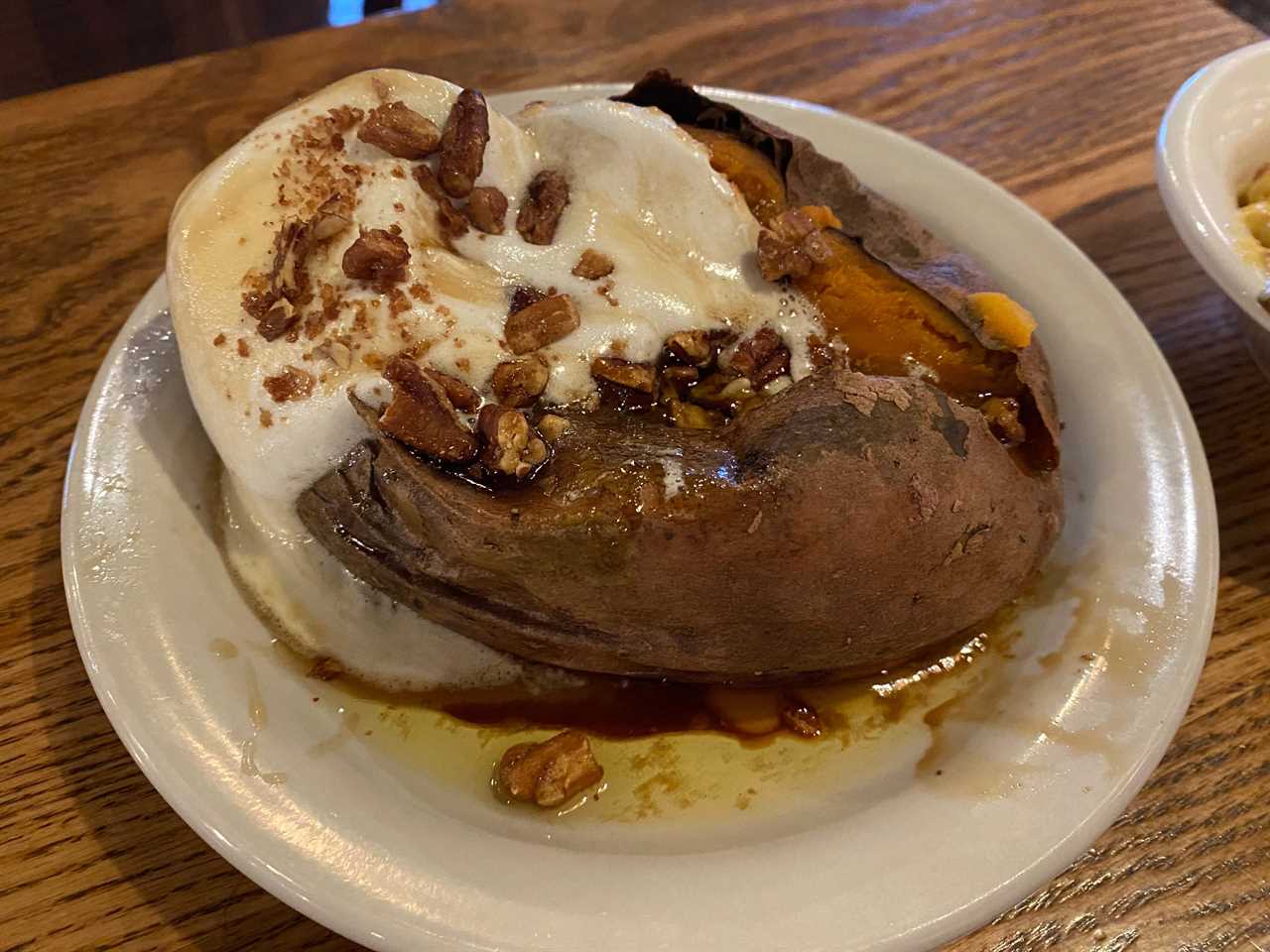 baked sweet potato with marshmallow, nuts, and cinnamon at cracker barrel