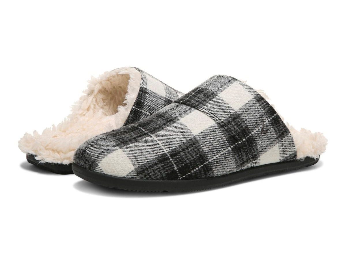 A pair of plaid mule house slippers.