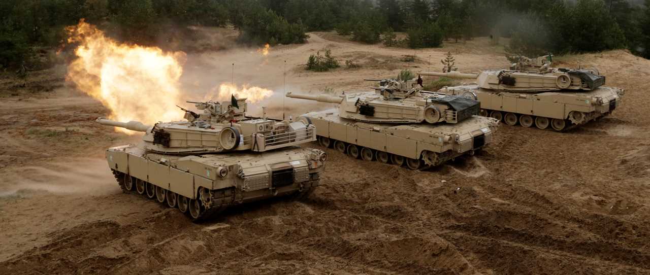 US M1 Abrams tanks fire during the "Saber Strike" NATO military exercise in Adazi, Latvia, 2016.