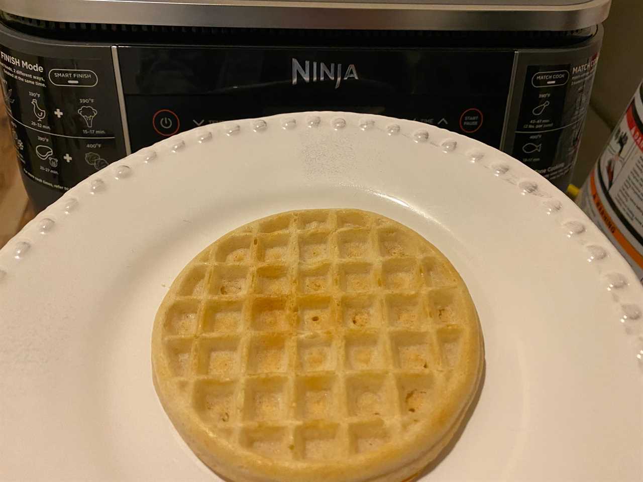 a frozen waffle on a white plate