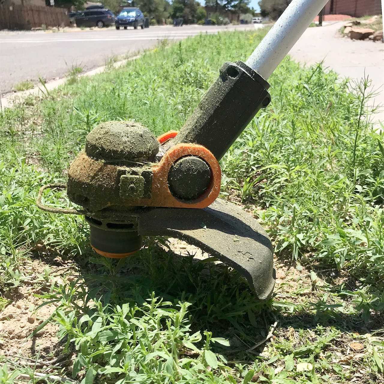 cutting grass with the Worx 3 Cordless String Trimmer