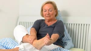 foot pain senior woman