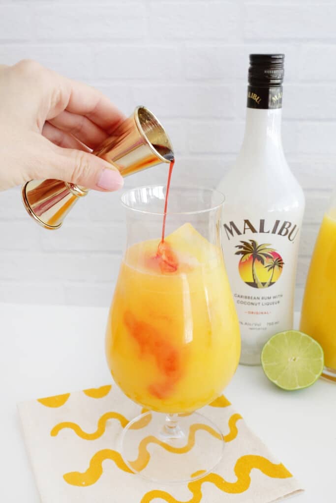 making a bahama mama cocktail